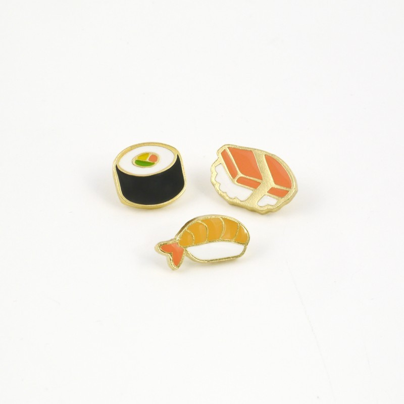 zestaw przypinek marki Pinswear przypominających sushi